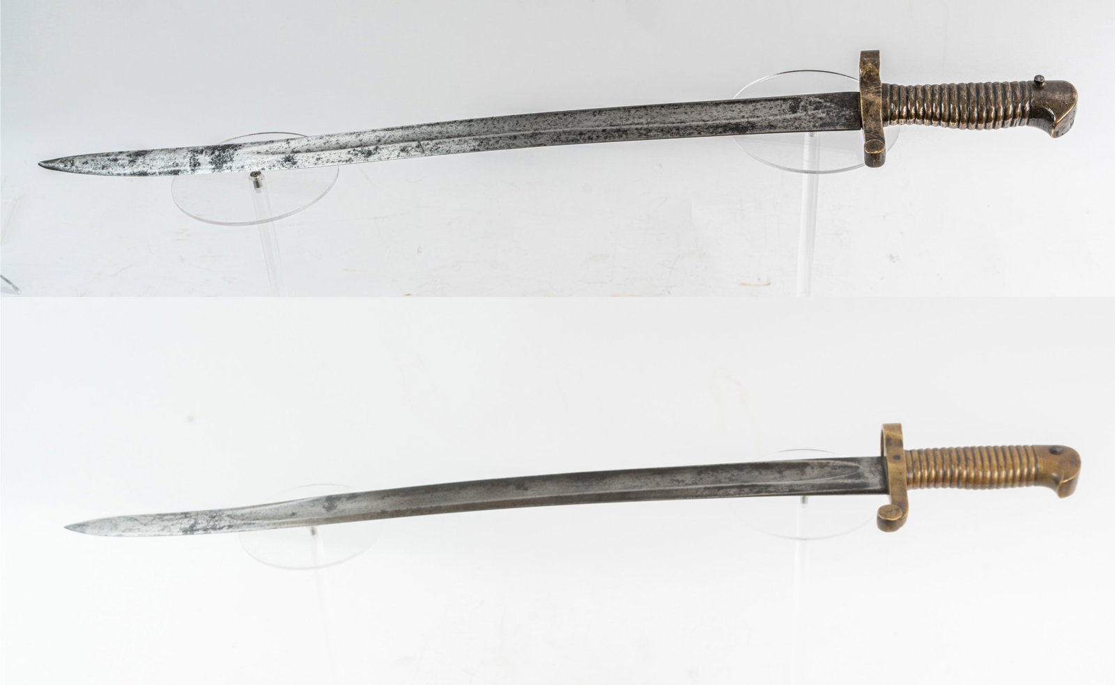 Lot of Two Civil War Era Bayonets.: A collins stamped "Collins & Co. / Hartford / Conn." model 1861 Naval Plymouth bayonet 27" long. And a non marked bayonet 24-1/2" long.