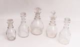 Grouping of Five Antique Clear Glass Ringed Decanters.