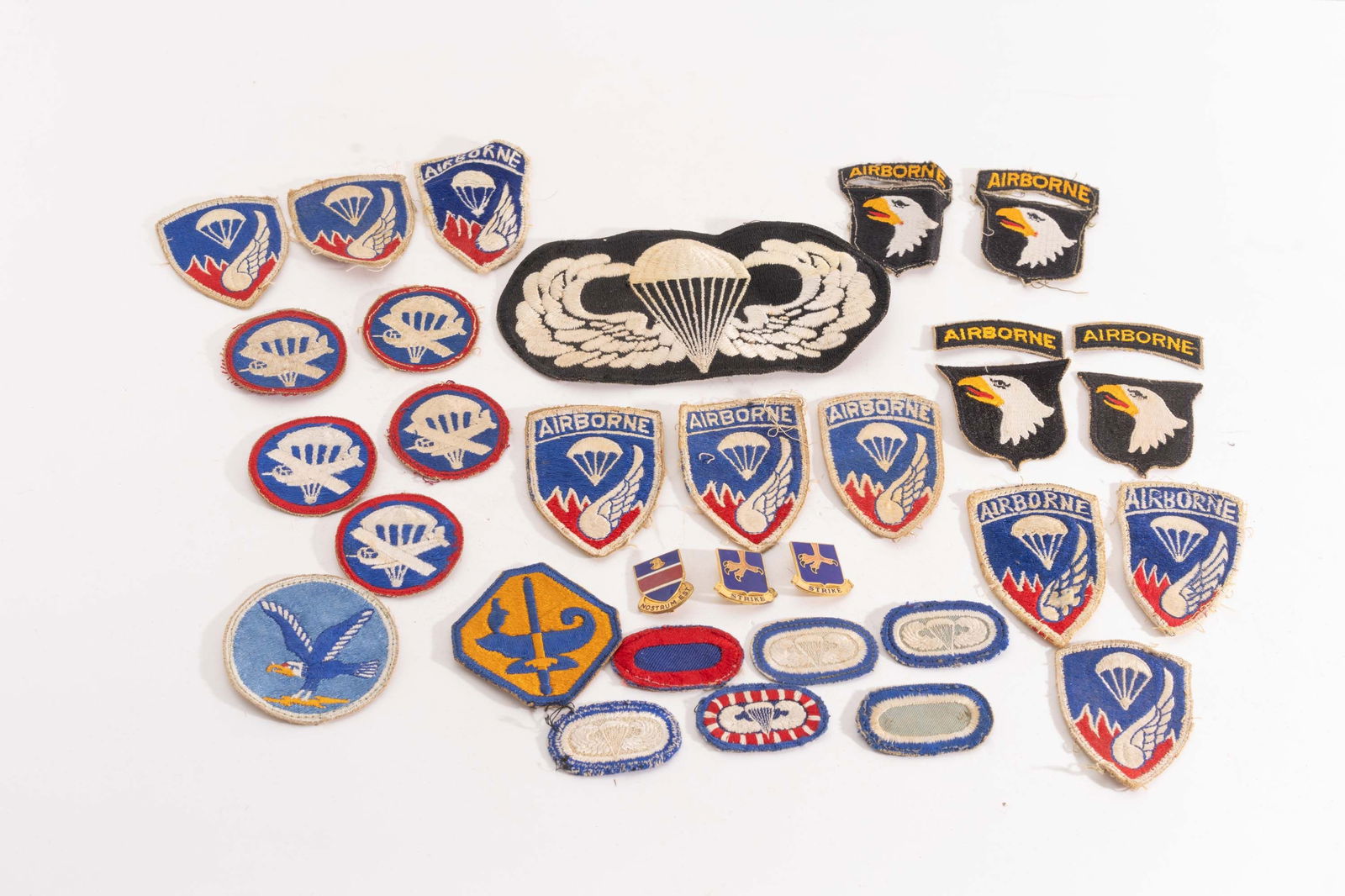 Lot of WWII Era Army Airborne Patches and Tins. (1 of 2)