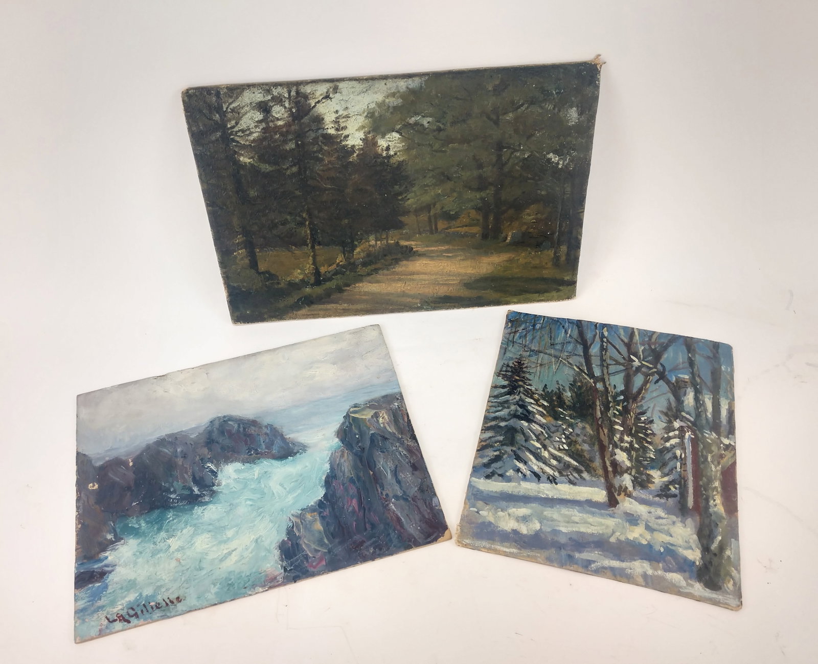 Lot of Three Original Oil Paintings.: A vertical winter landscape oil on canvas board that is stamped on the rear "Painted by Donald Gordon Squier" a well known WPA artist. Measures 9-3/4" x 8" with some edge paint loss. A signed "L A Gil