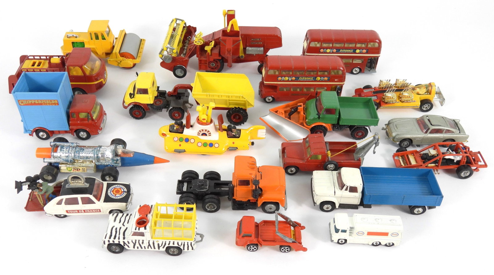 20PC Corgi Die Cast Cars & Tractors: Collection of various Corgi vehicles including double decker busses, the Beatles yellow submarine, and race cars amongst others. From the collection of a Needham, Massachusetts estate.