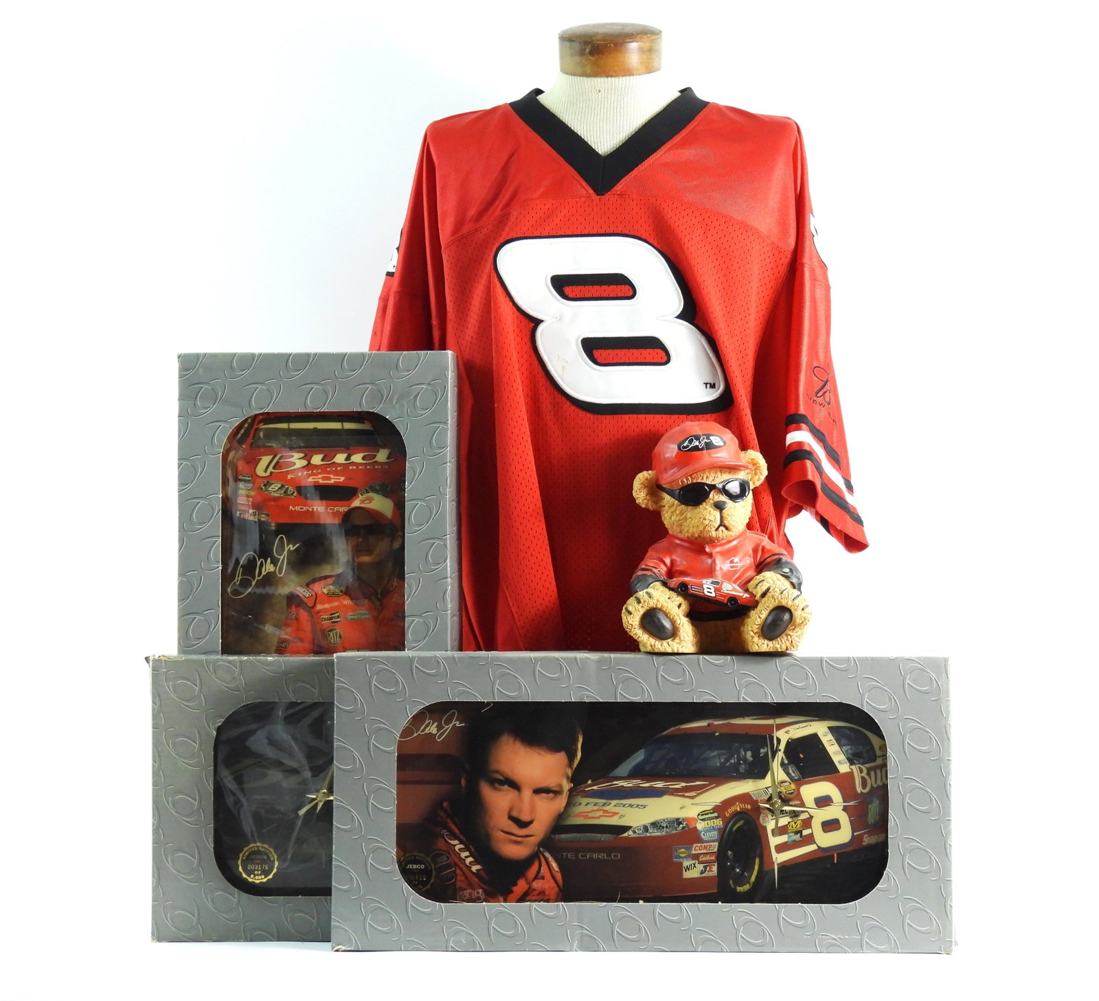 5PC Dale Earnhardt Jr. Clocks & Other Items: Includes three Dale Earnhardt Jr. bar clocks, a bear statue, and a red jersey. From the collection of a Medfield, Massachusetts estate.