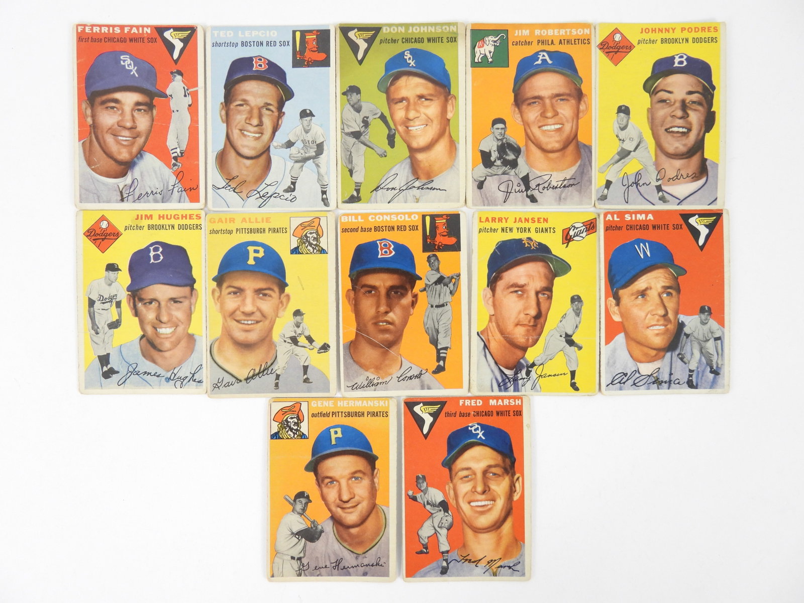 12PC 1954 Topps Baseball Trading Cards: Includes card numbers 27, 66, 146, 149, 166, 169, 179, 195, 200, 216, 218, and 228. From the collection of a Needham, Massachusetts estate.