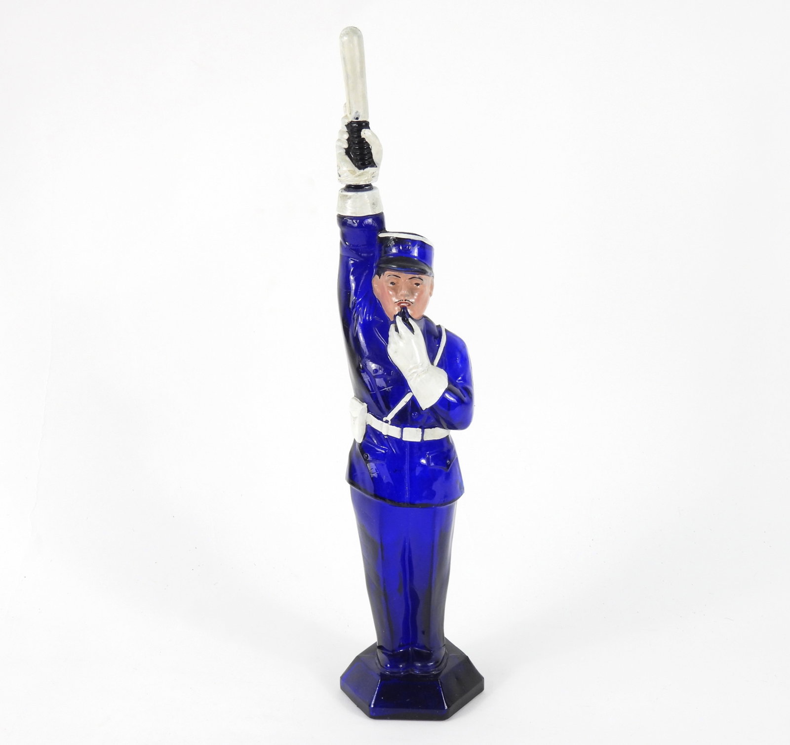 Lg Cobalt Glass Policeman Decanter: france, Circa 1950. Painted cobalt glass decanter of a traffic cop or policeman with baton stopper. From the collection of a Warren, Massachusetts estate.Overall with stopper 18 3/4"