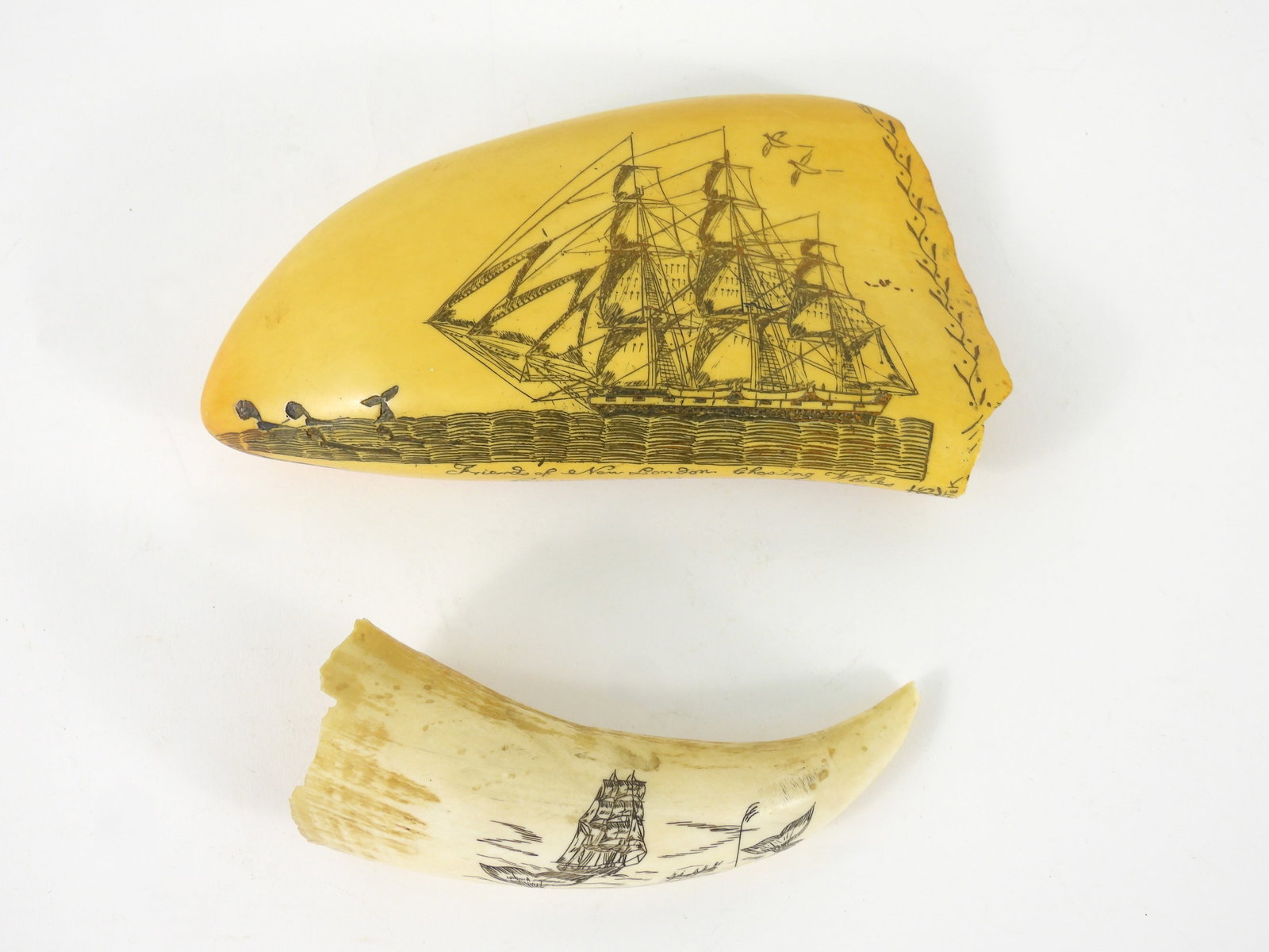 2PC Reproduction Engraved Whale Teeth: United States, 20th Century. Includes a whale tooth depicting a whaling scene appearing to be signed "PJR" lower left of image, and a resin reproduction tooth by Artek of scrimshaw created by Edward B