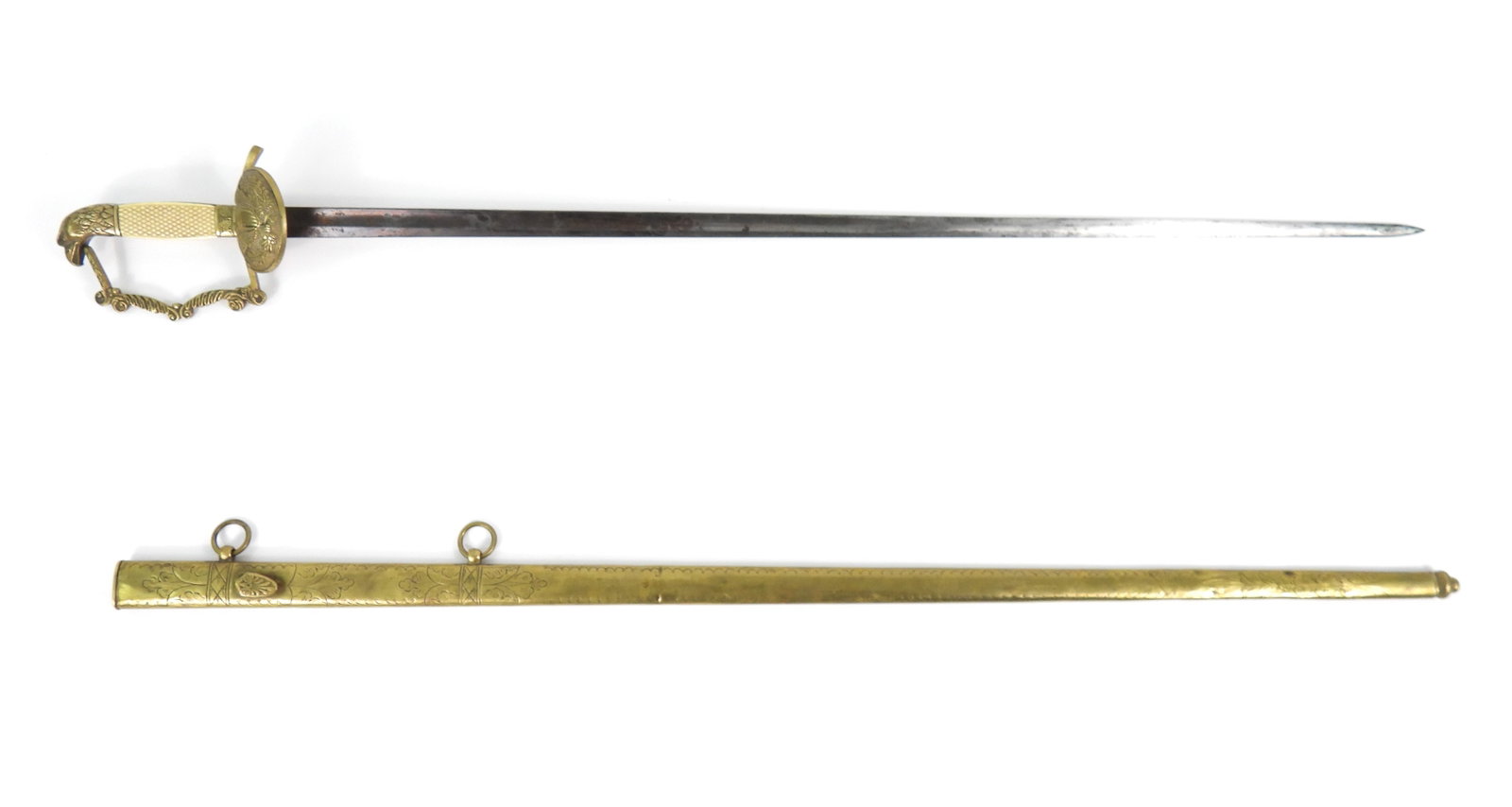 Eagle Pommel Sword and Scabbard: Eagle pommel, knuckle bow is cast with foliate designs on one side and plain on the other, checkered bone grip, single langet with eagle and shield, steel blade with engraved foliate designs and panop