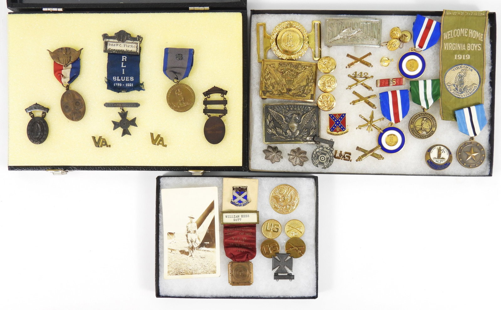 Group of Virginia-related Insignia: A group of insignia from William Hess including an image, collar discs, encampment ribbon, and cap insignia; a group of Richmond Light Infantry Blues insignia and a group of belt plates, buttons, and 