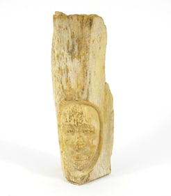 Carved Petrified Whale Bone Figural Sculpture