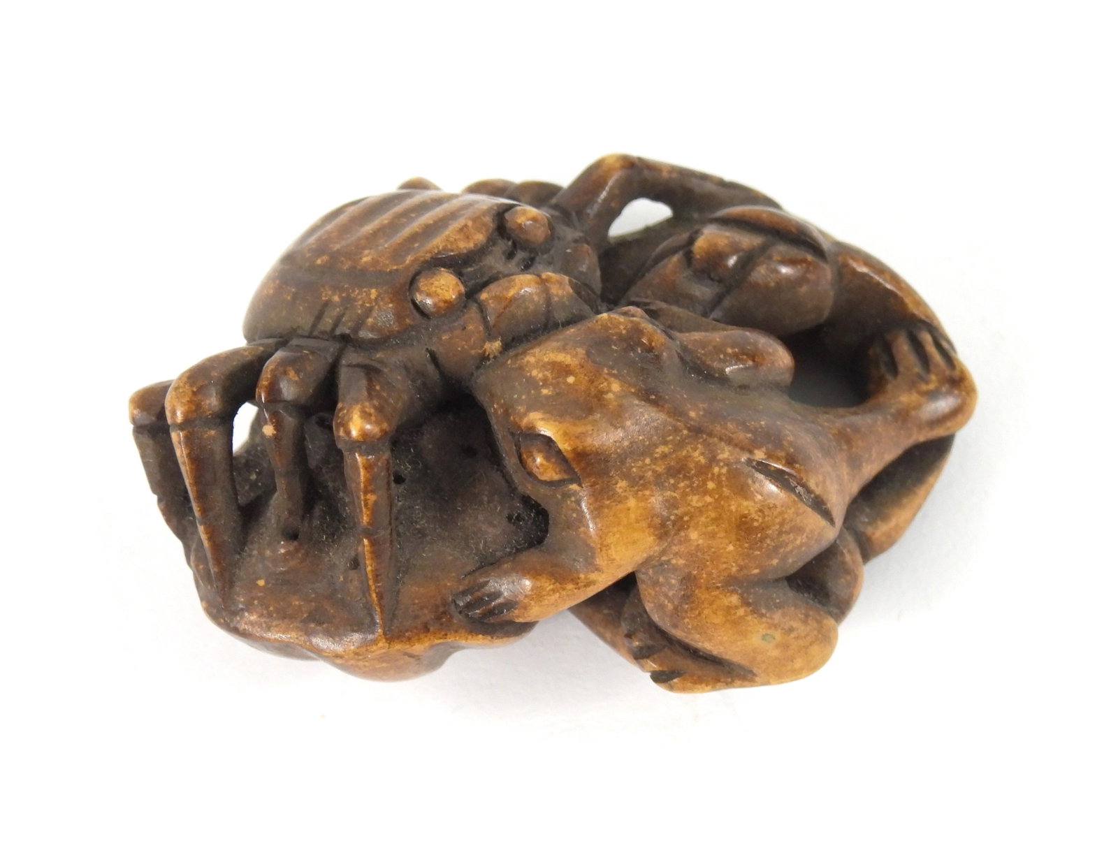 Chinese Frog & Crab Carved Wood Sculpture: China, Late 19th-Early 20th Century, Wood. Finely carved miniature sculpture depicting a crab and a frog seated on a lotus. From the collection of a Dartmouth, Massachusetts estate.