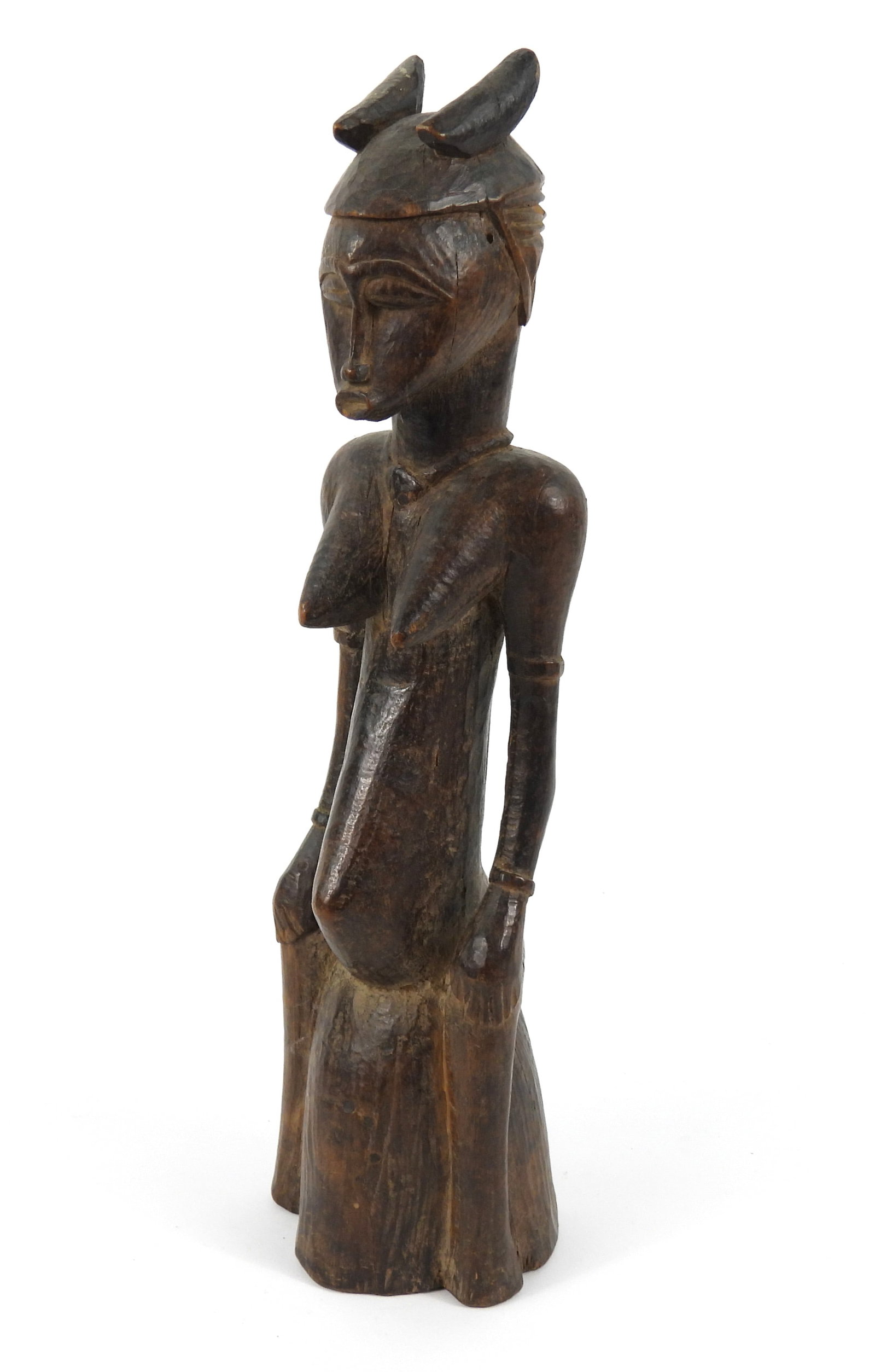 African Carved Wood Fertility Sculpture: Africa, Early 20th Century, Wood. Carved wood fertility sculpture depicting a feminine form with pronounced breasts and distended abdomen. From the collection of a Princeton, Massachusetts estate.