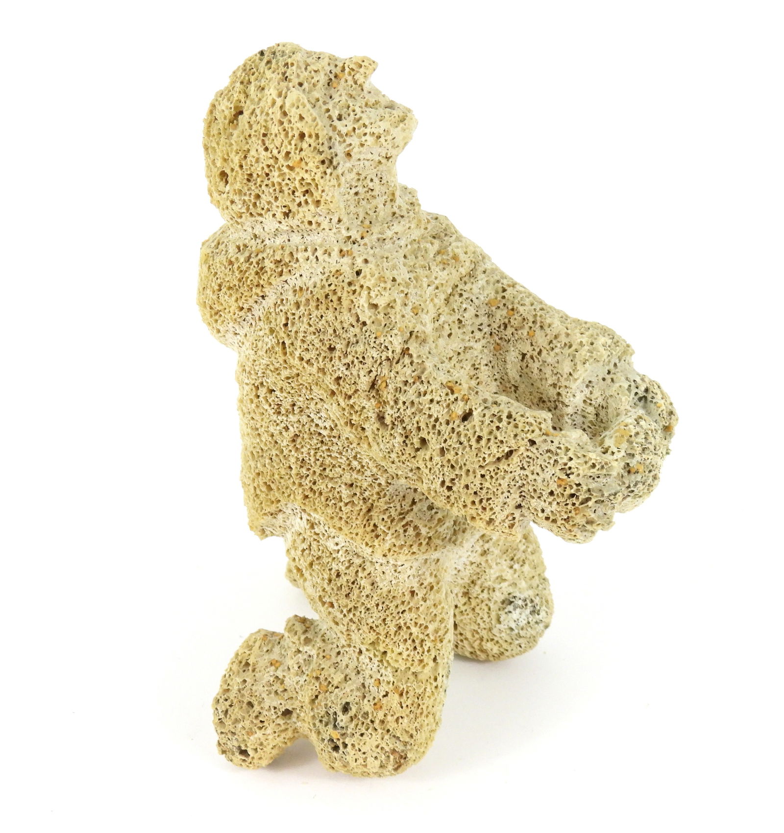 Carved Petrified Whale Bone Sculpture: North America, Early 20th Century, Bone. Depicts a kneeling figure with arms outstretched and face tilted towards the sky. From the collection of a Princeton, Massachusetts estate.