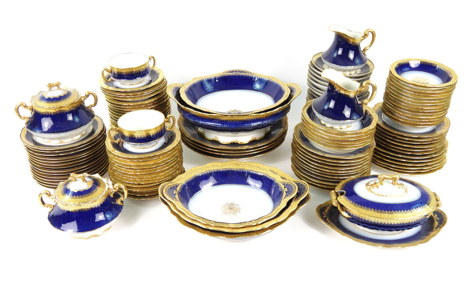 LG Collection of Haviland Porcelain Dinnerware: France, 20th Century, Porcelain. Large collection of blue and white porcelain ware including two creamers, two sugar bowls, a covered tureen with under plate, four bowls, five assorted serving dishes,