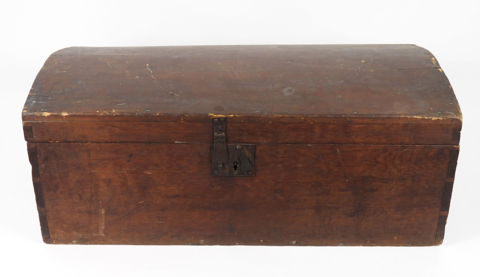 19C Antique Curved Top Wood Chest: 19th Century, Wood. Wood curved top trunk of dove tailed construction opening to a single compartment with wrought iron hardware. Approx. 12" t x 29" w x 14 1/2" d