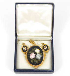 3PC Victorian Pietra Dura Pendant & Earrings Set: Late 19th Century, Metal, stone. Includes a pendant brooch with a pair of matching earrings depicting three roses of yellow, blue, and pink color. Pendant 3" x 2", Earrings 2" x 3/4"