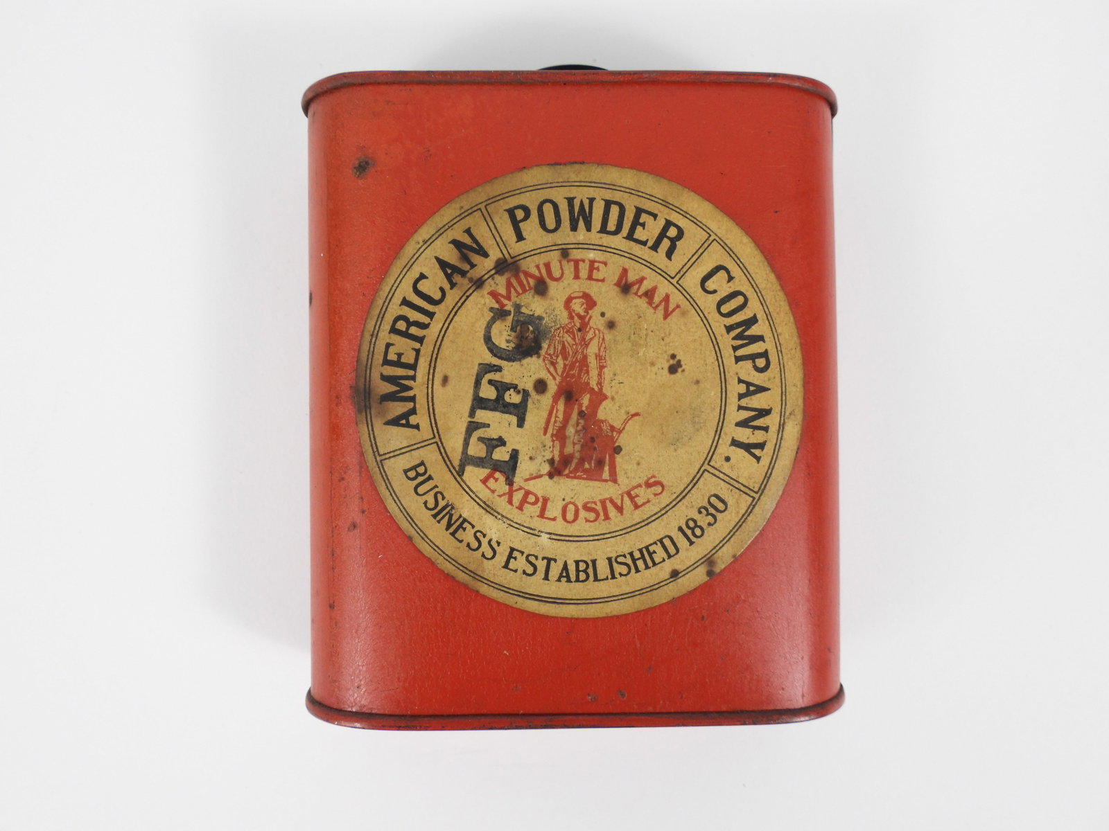 Antique Empty Minute Man Powder Can FFG: United States, Metal. Paper label American Gun Powder Company black powder storage canister. 4" t x 3 3/8" w x 1 1/8" d