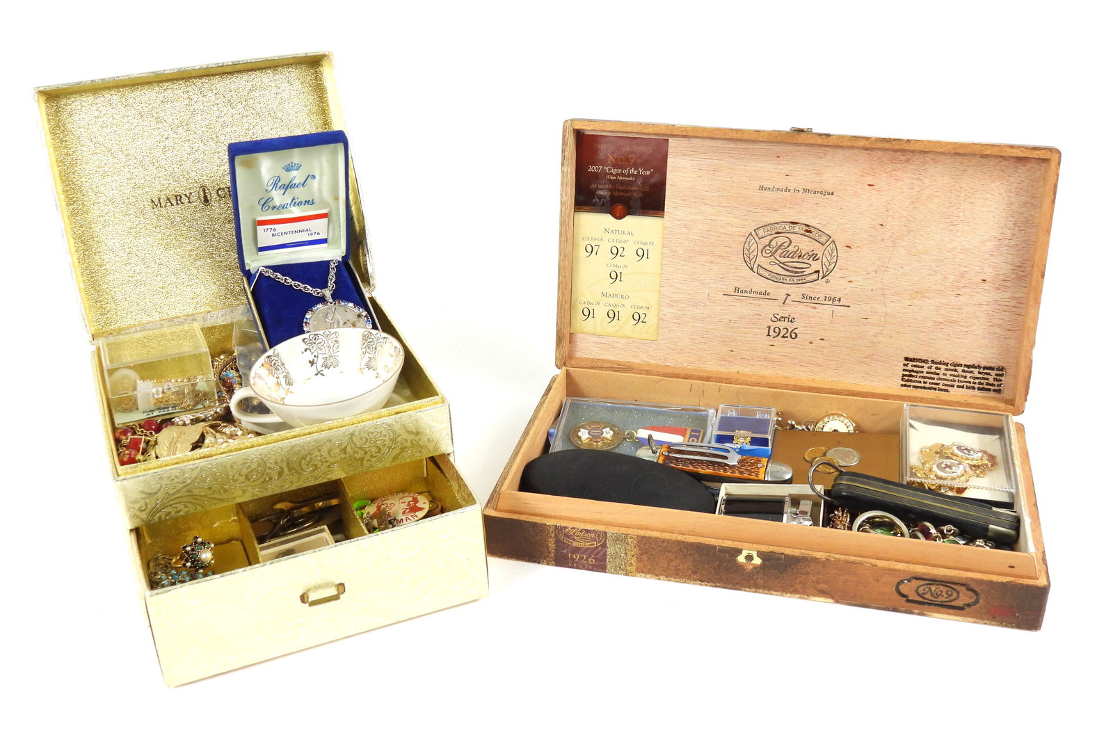 Collection of Miscellaneous Jewelry & Other Items: 20th Century, Metal, enamel. Collection of assorted jewelry, porcelain tea cup, pins, and pocket knives amongst miscellaneous items in two separate boxes. Gold box 4 1/2" t x 6 3/4" w x 5 3/4" d, Wood