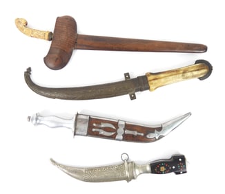 Four Antique Middle Eastern Daggers
