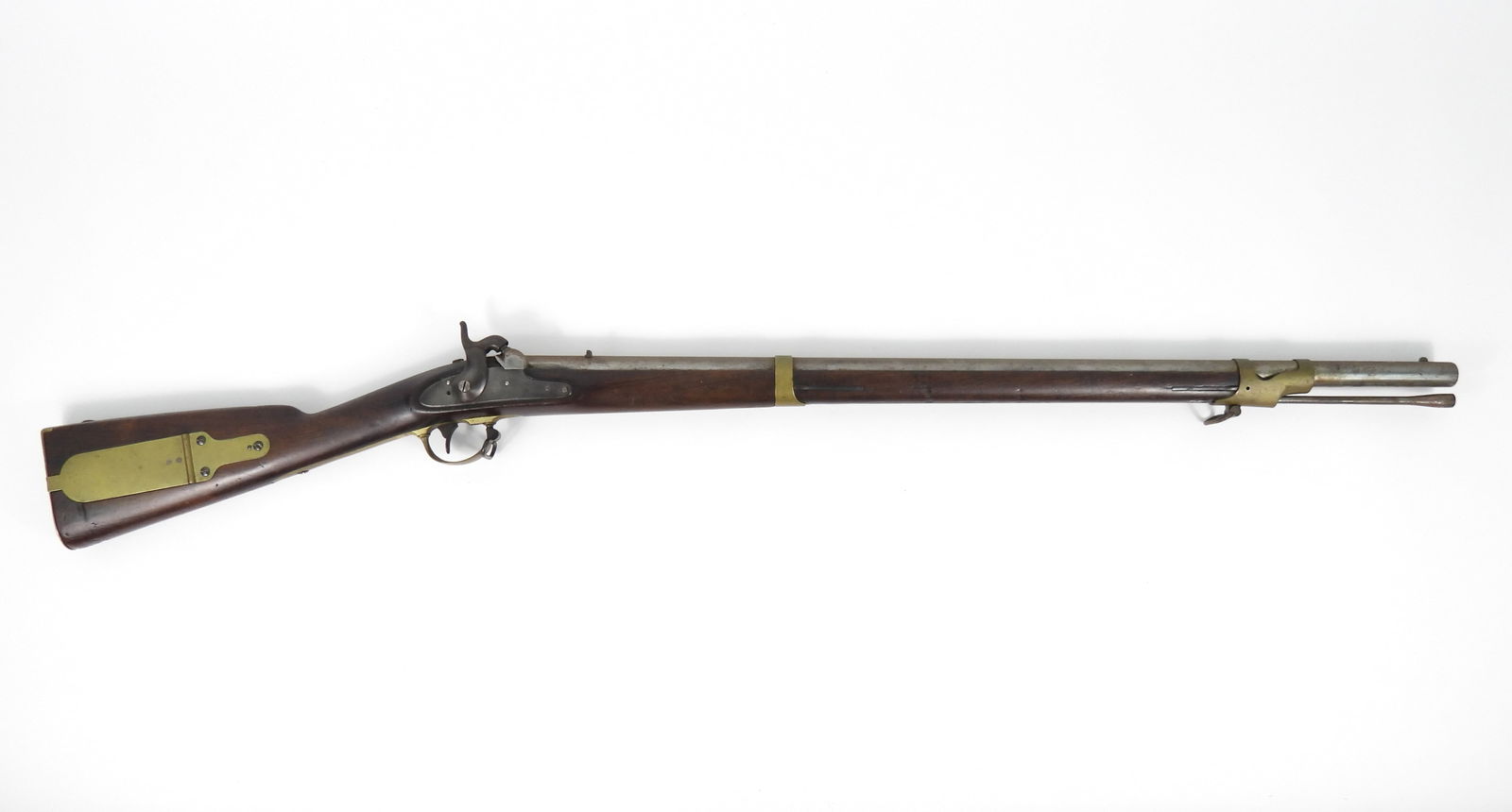 U.S. Model 1841 Mississippi Percussion Rifle: United States, 1848. .54 caliber, NSN, walnut stock, brass fittings, and brass patch box on the right side of the butt with a spare nipple. The lock is marked on the tail "WINDSOR VT./1848", and marke