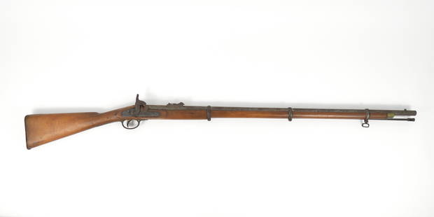 British Pattern 1853 Enfield Musket: England .577-caliber, NSN, walnut stock marked "CROOKE" on the left side, brass butt plate, trigger guard, and nose cap, steel barrel bands, all markings are illegible, with a rear leaf sight and a st