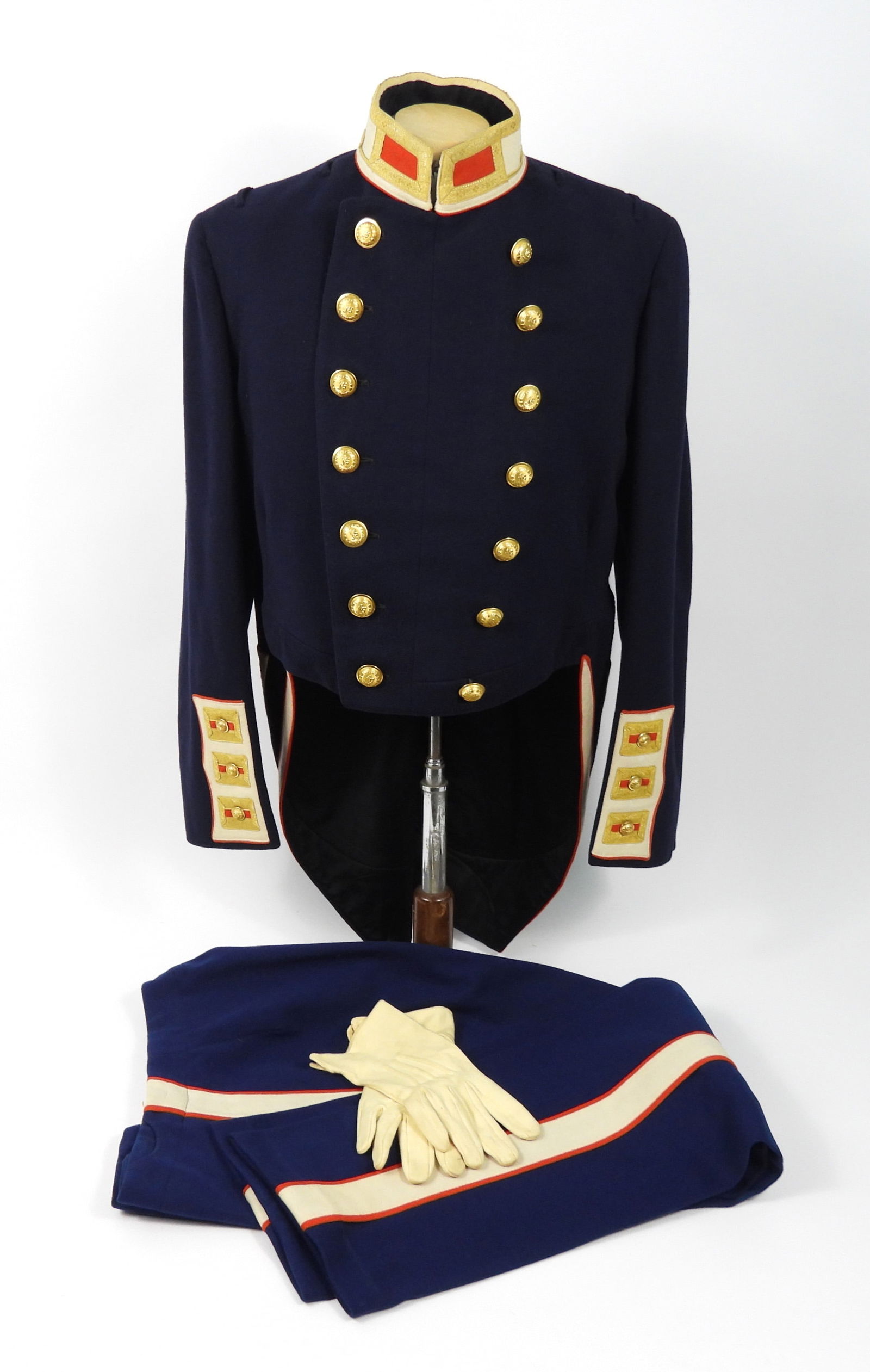 Pennsylvania National Guard Coatee and Trousers: United States, Late 19th-Early 20th Century. Dark blue broadcloth body, white trim with gold metallic lace and orange accents, black lining with a William Horstmann label, white cotton gloves in the p