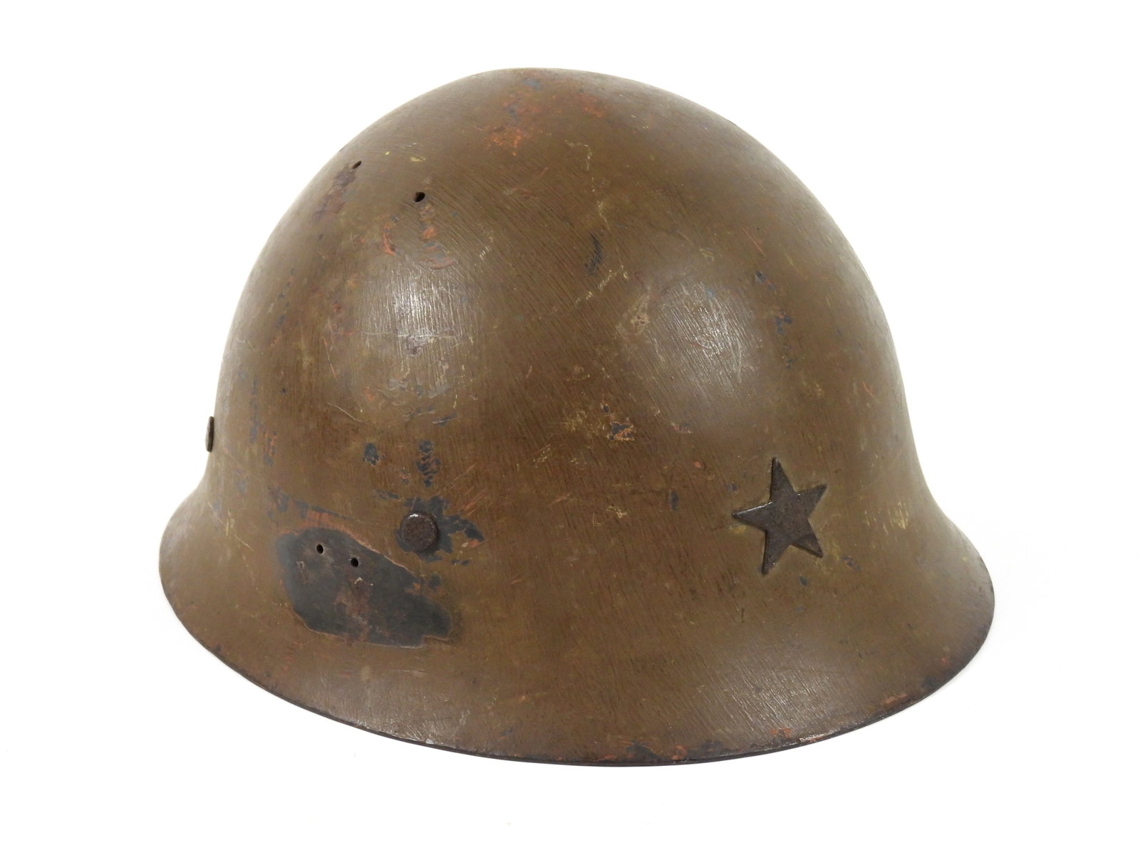 WWII Imperial Japanese Helmet: Japan. Brown-painted helmet shell with a star on the front, inside the back rim is a Japanese marking, with a canvas liner and leather chinstraps.