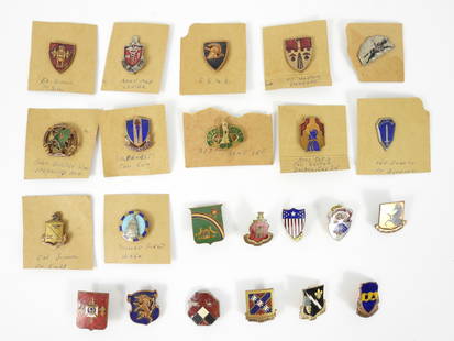 Collection of Military Unit DIs: United States, Circa 1940. WWII-era distinctive unit, school, and location insignia I'Ds. Some are pin, screw, and clutch back. 23 items in the lot. Average size 1 1/4"