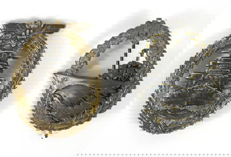 2PC WWII German Kreigsmarine Badges: Germany. A High Seas Fleet badge with gilt wash on the wreath and eagle (some loss), marked on the back "FEC ADOLF BOCK/AUSF.SCHWERIN BERLIN"; and a Destroyer badge with remnants of gilt wash, marked