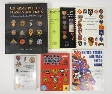 7PC Military Insignia Metals Patches Books: Seven reference books on U.S. military decorations and patches including US Army Patches Flashes & Ovals, U.S. Shoulder Patches, U.S. Military Medals, and Marine Badges & Insignia. Largest 13" t x 11"