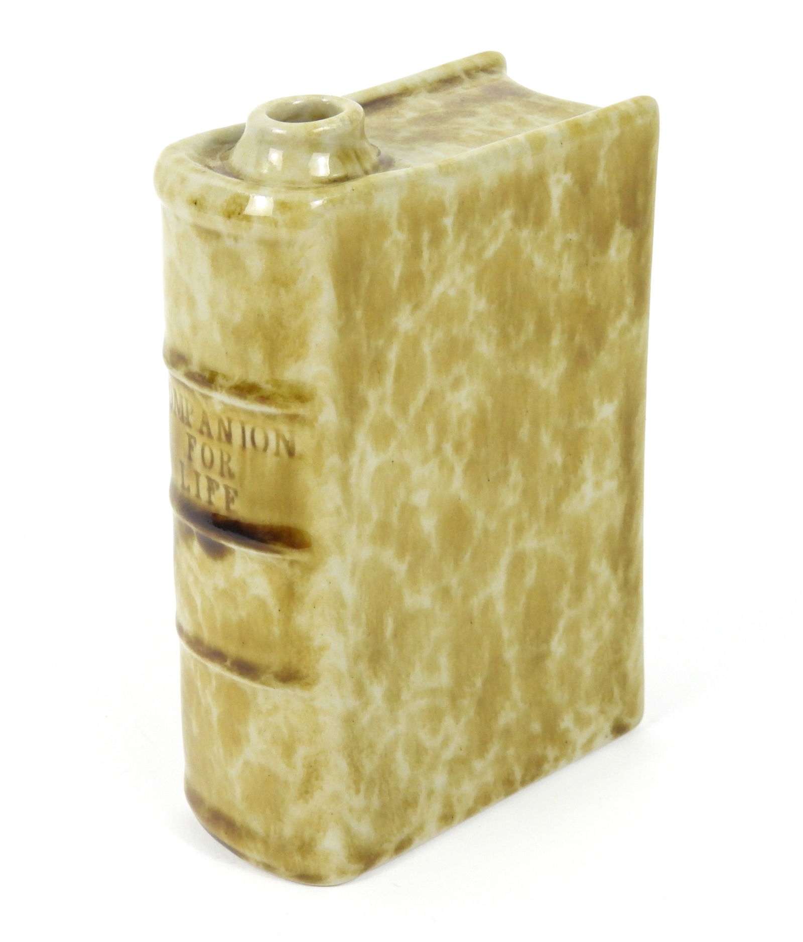 Bennington Fenton Ceramic Book Flask: Vermont, Late 19th Century, Ceramic. Book shaped ceramic flask marked "Companion for Life" on binding side.