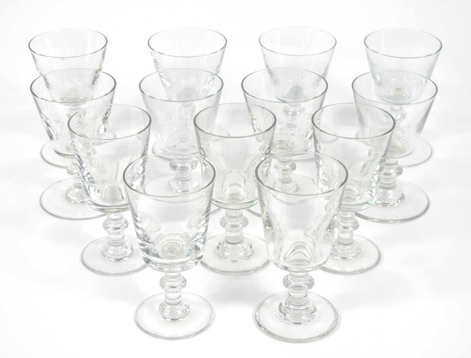 13PC Baccarat Sully Pattern Stemware: France, 20th Century, Glass. Includes five clear glass sherry and eight wine glasses in the Sully pattern.