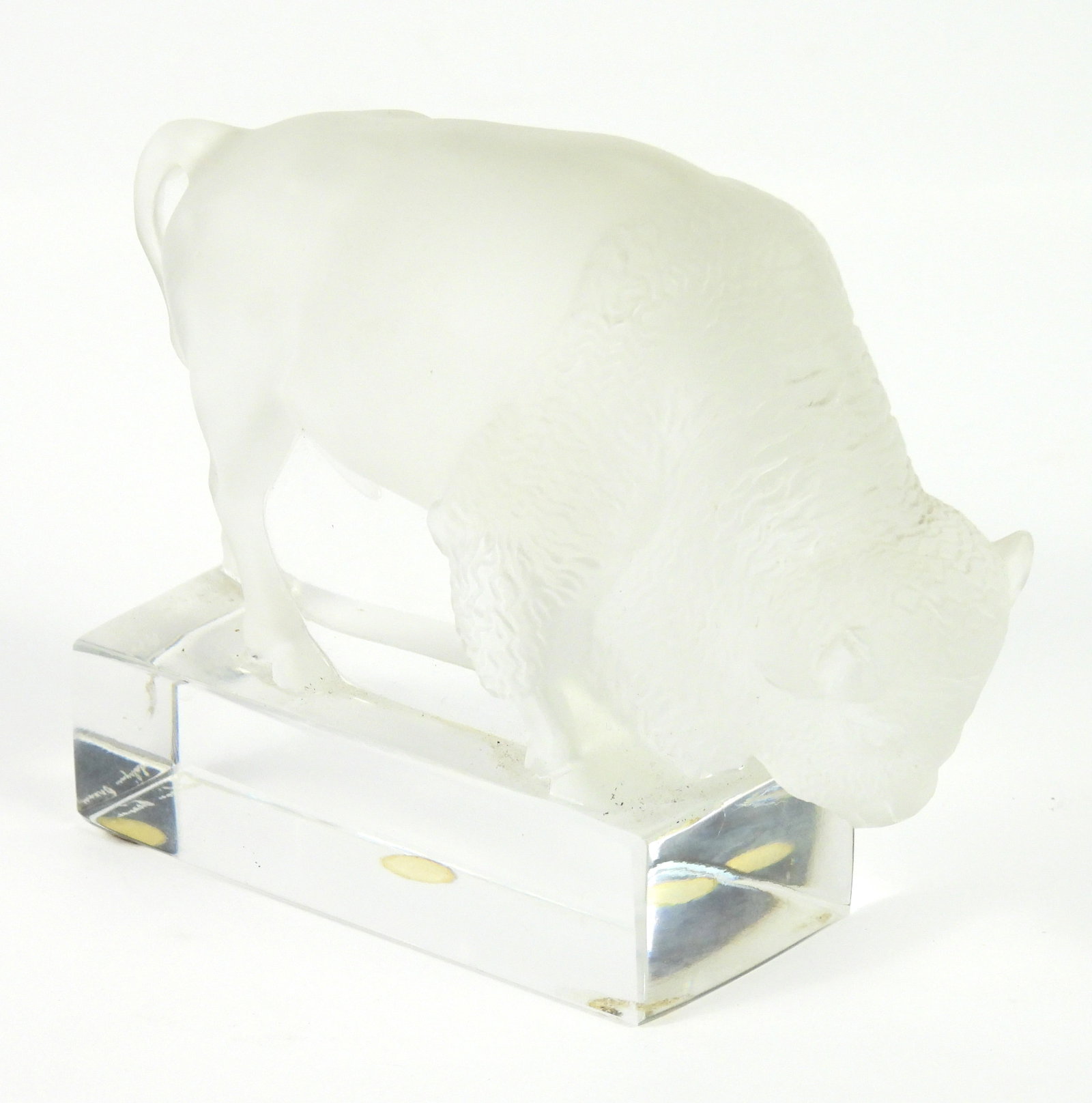 Lalique Frosted Bison Glass Sculpture: France, 20th Century, Glass. Lalique frosted glass bison over a smooth glass base.