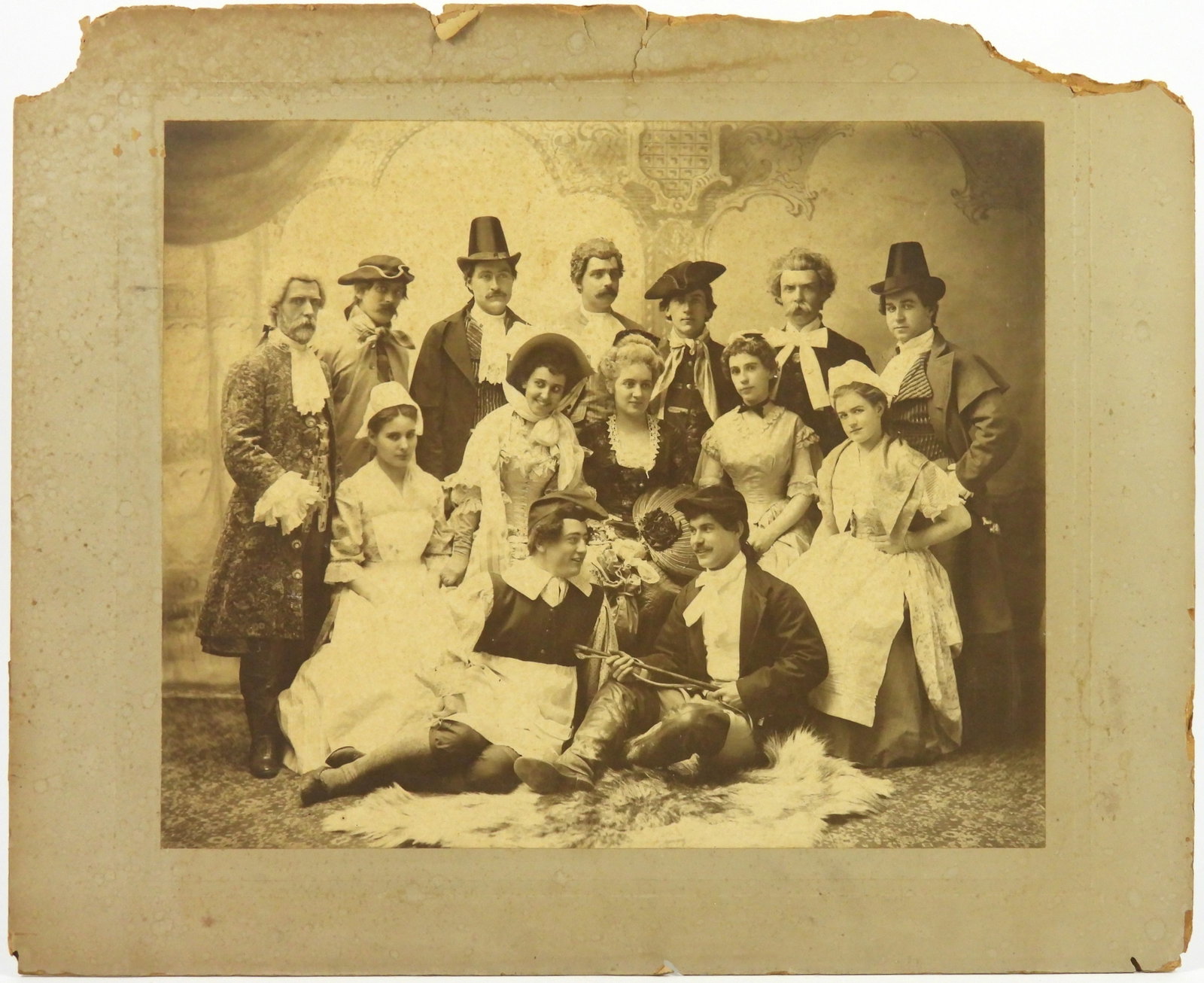Antique Theater Troupe Group Photograph: United States, Early 20th Century, Photograph. Theater troupe photo depicting men and women posing as a group dressed in various costumes.
