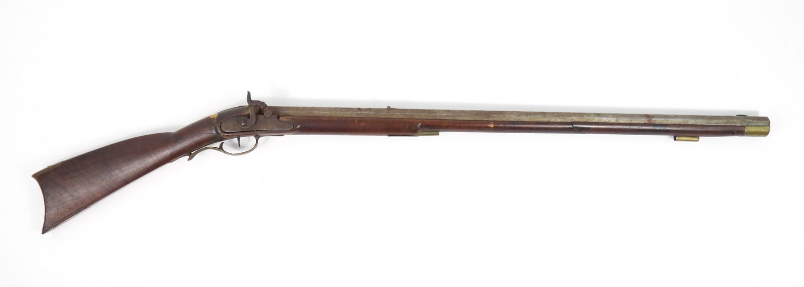 19C Full Stock Percussion Rifle: Curly Maple full stock rifle with carved cheek rest stock. Barrel and lock have no observed maker stamps. Octagon 32" barrel, approx. .55 cal. with worn non observed groves.