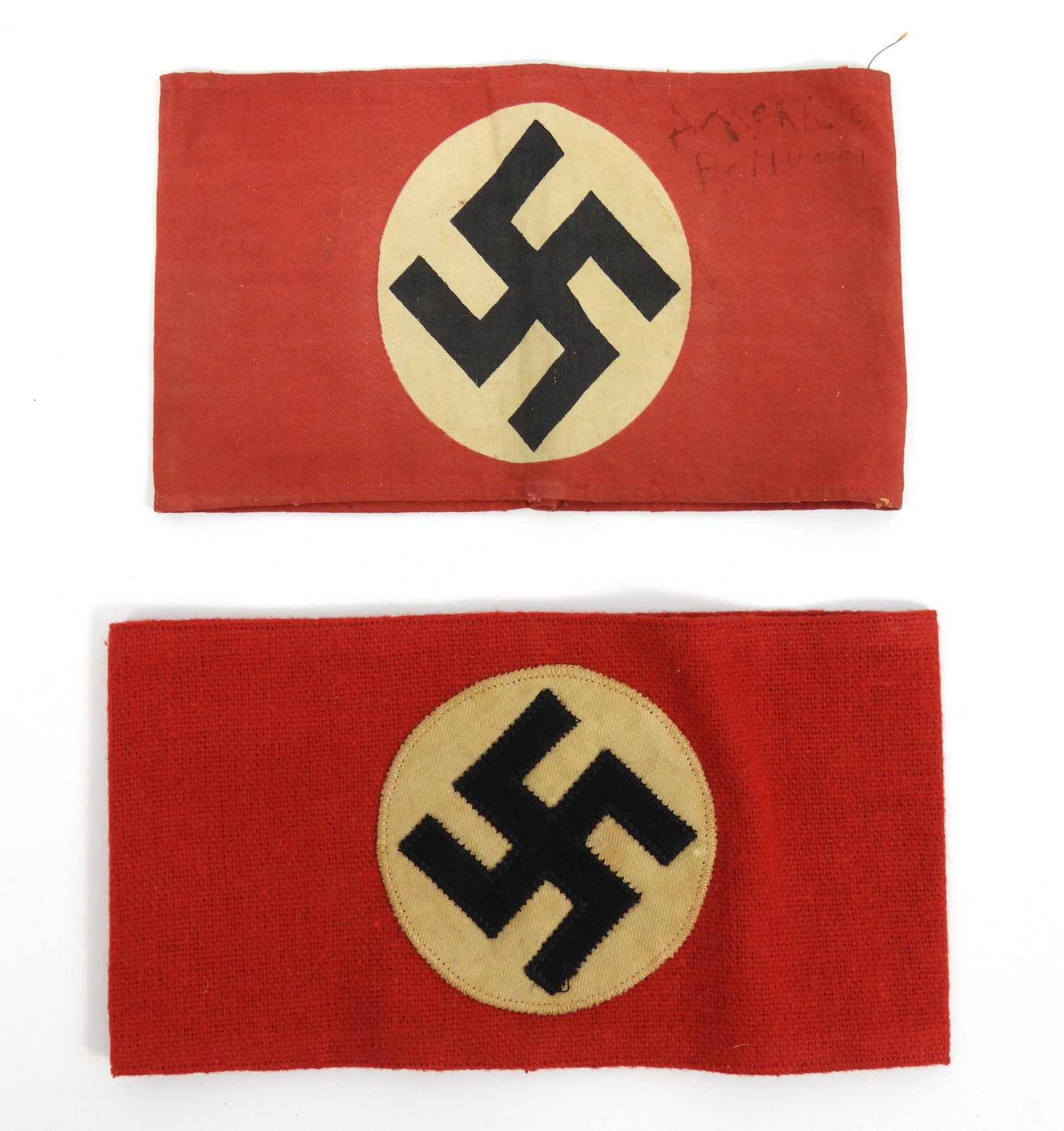 Two WWII German Armbands: Germany. A wool armband with machine sewn white twill woven circle, and a black wool swastika and a Clemens Wagner/Hamburg stamp on the inside; and a printed armband with a name inked on the front.