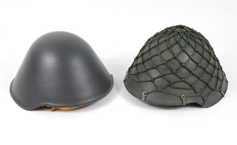 Two East German Helmets