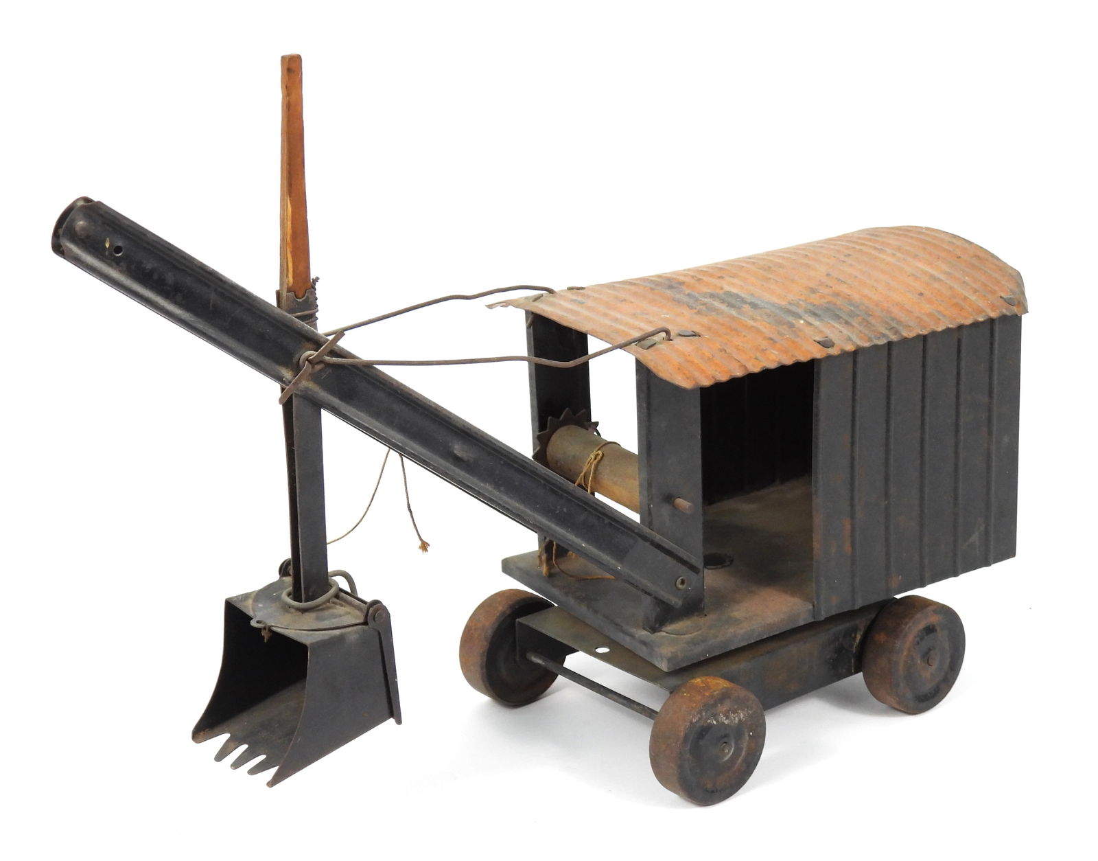 Antique Pressed Steel Excavator: United States, Early 20th Century, Steel. Structo style pressed steel excavator with brown body and orange roof. Approx. 12 1/2" t x 6" w x 17" d