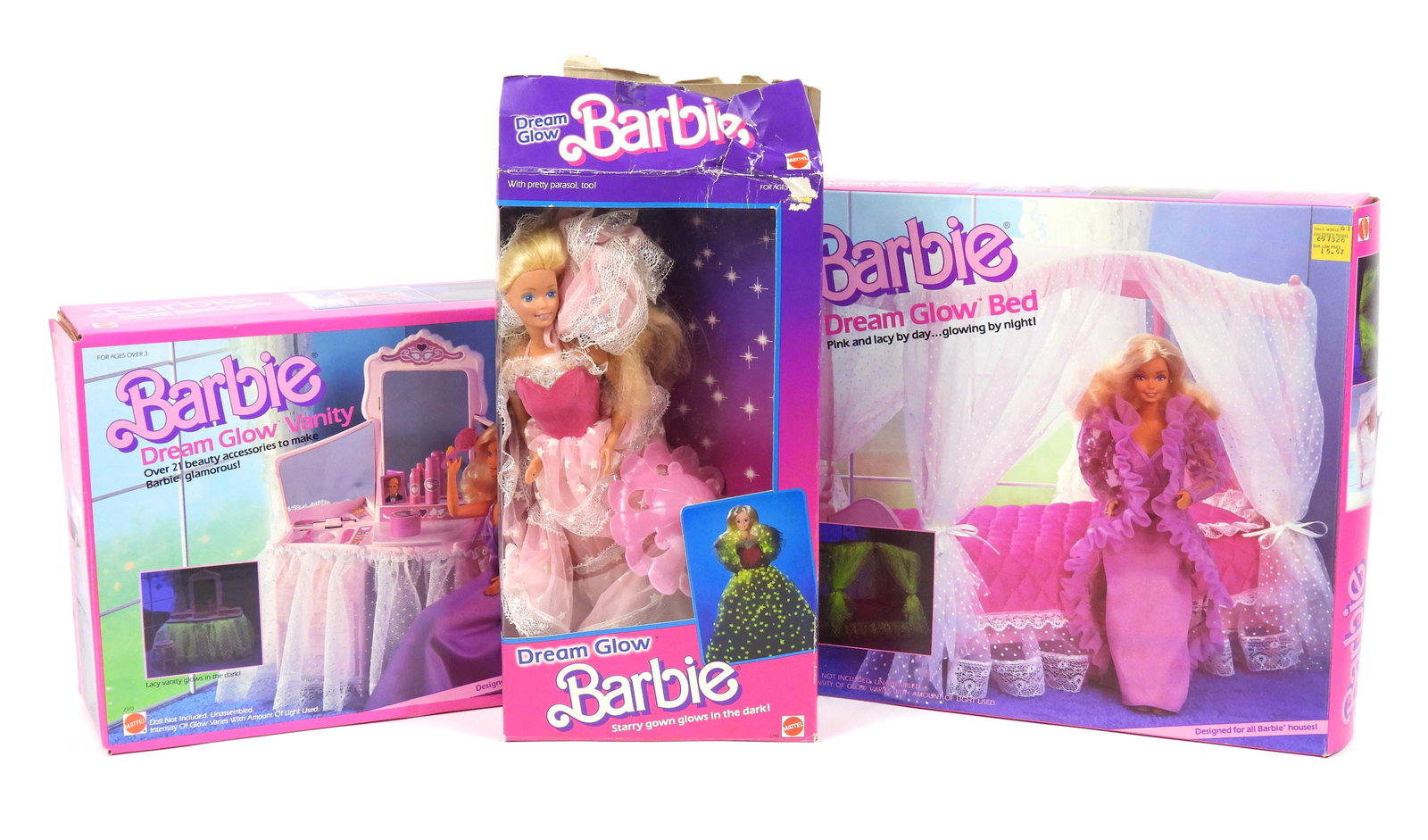 3PC 1985 Barbie Dream Glow Doll & Sets: Circa 1985, Plastic, textile. Includes a MIB Barbie Dream Glow Vanity set, a Barbie Dream Glow Bed, and a Barbie Dream Glow doll. All pieces include their original boxes, doll and bed set have been op