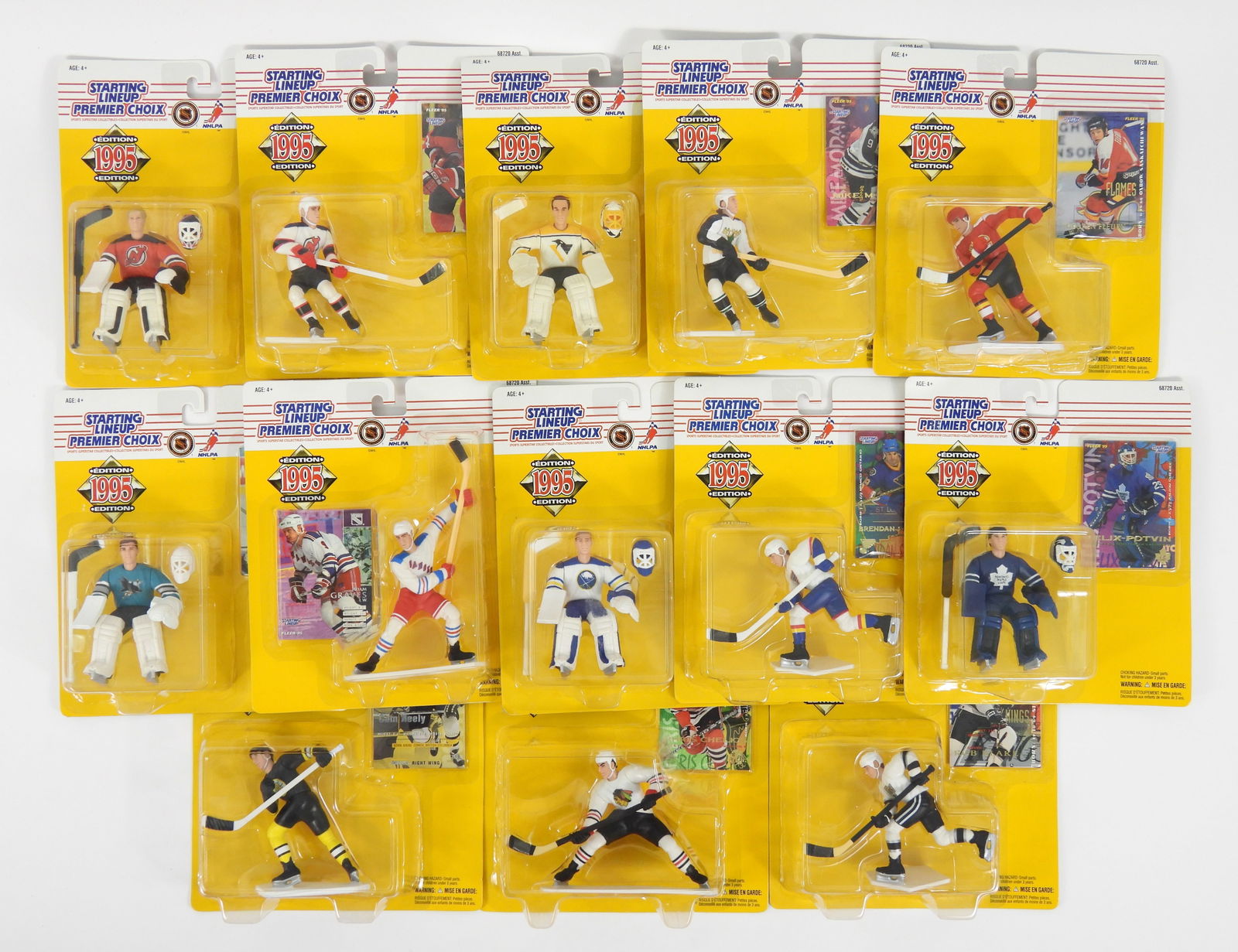 13PC Kenner Starting Lineup Hockey Figures: Kenner Starting Lineup hockey figures including Mike Modano, Arturs Irbe, Cam Neely, Theoren Fleury, Adam Graves, and Rob Black amongst others. All 9" t x 8" w x 2" d