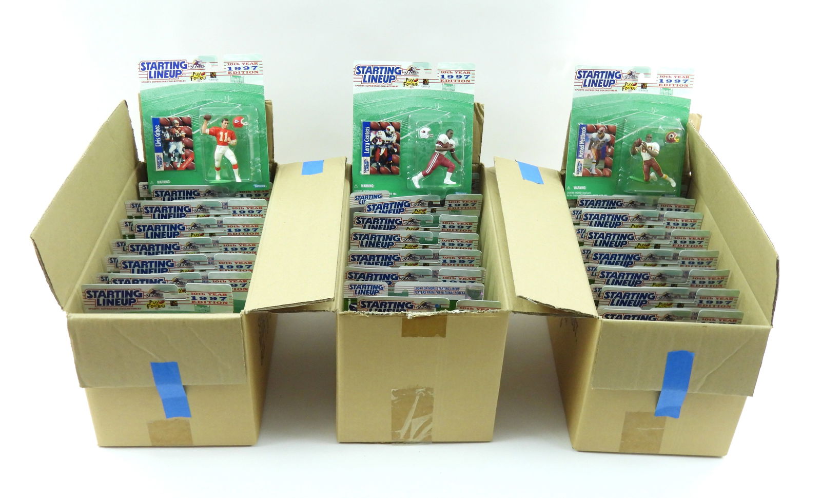 44PC Kenner Starting Lineup Football Figures: Fourty four Starting Lineup football figures split amongst three boxes in original JC Penney Special Starting Lineup shipping box. Each 9" t x 8" w x 2" d, Box 11 1/2" t x 16 1/2" w x 28 1/2" d