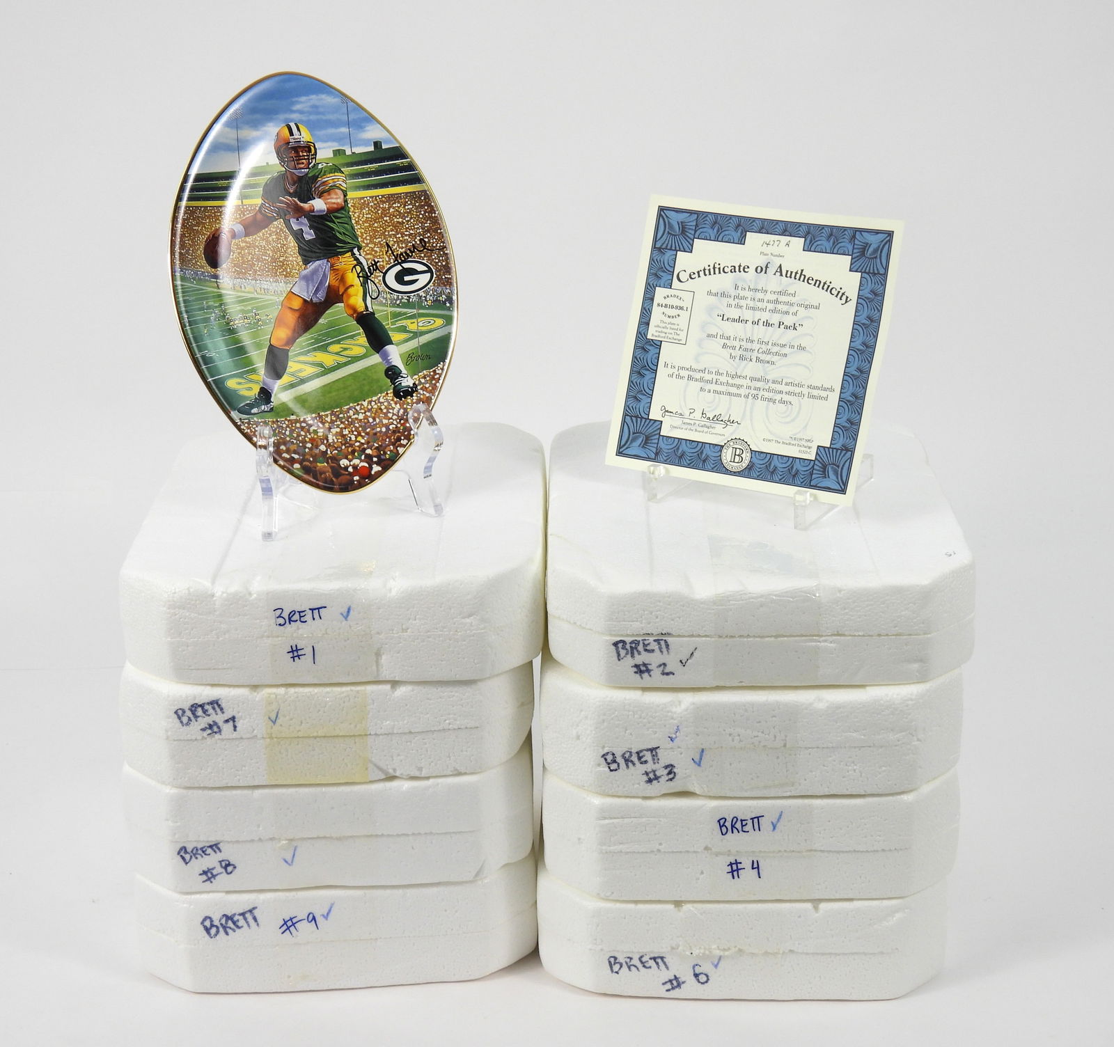 8PC Bradford Editions Brett Favre Collection: Includes Artic Rivalry, Showdown with Miami, No Stoppin' the Pack, The Mudbowl, The Pack is Back, 3 Degrees to Victory, Back to Titletown, and Leader of the Pack collectors plates with COAs. Each