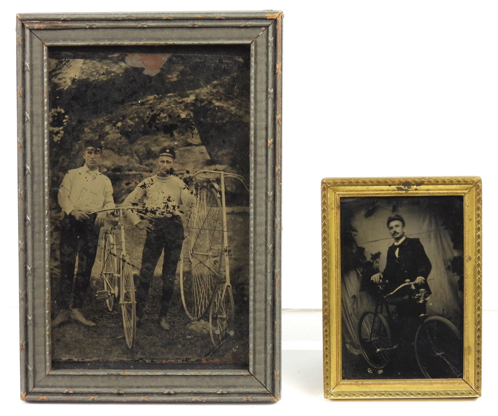 2PC Men w/ Bicycles Tintype Photographs: 19th Century, Tintype. Includes a depiction of a gentleman with a mustache in a suit posing beside a bike; and a depiction of two gentleman, one with a regular bicycle and one with a penny farthing.