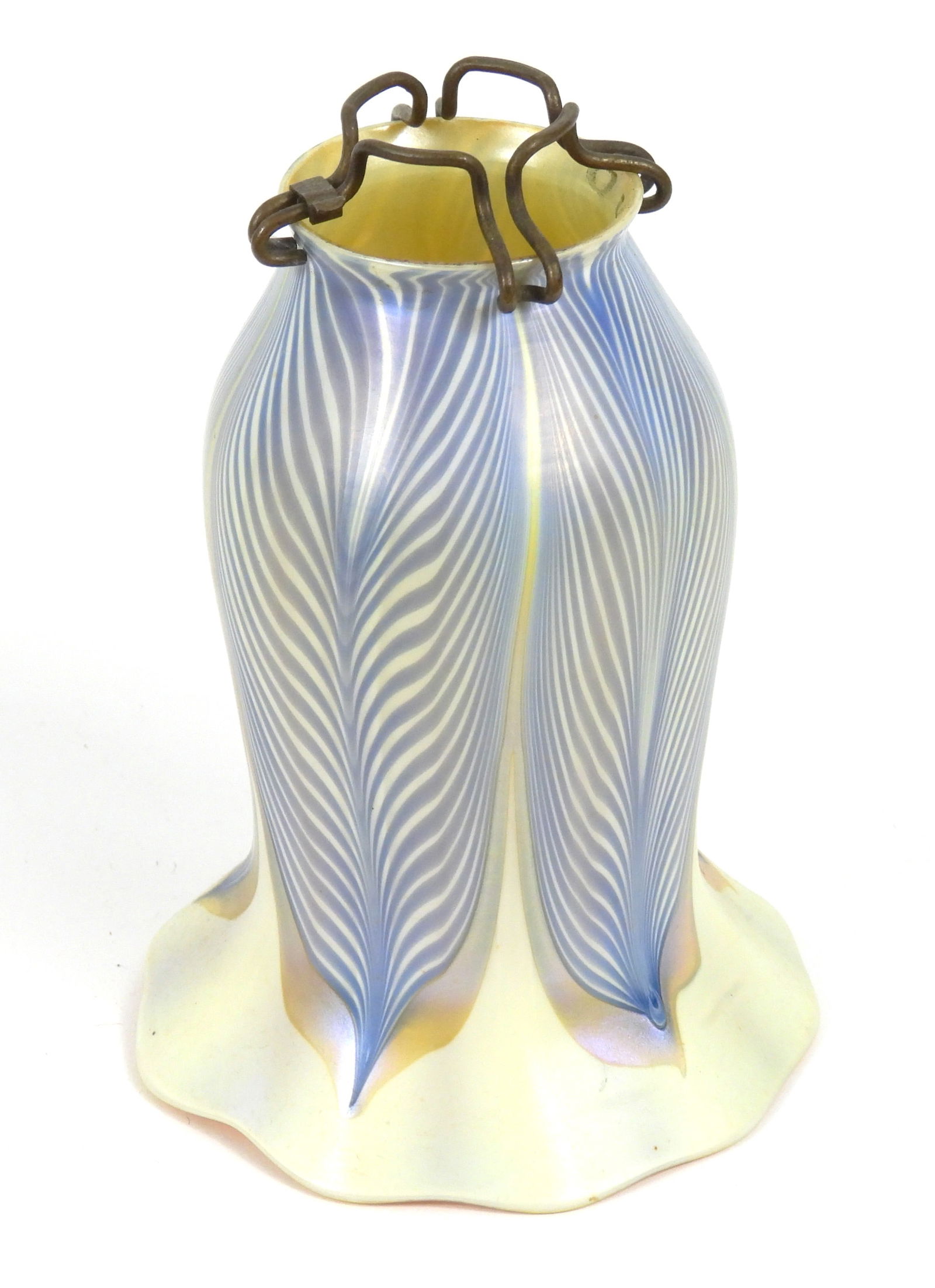 Quezal Blue Feather Pull Glass Shade: United States, Early 20th Century, Glass. Bell flower shaped glass lampshade with iridescent blue and yellow feather pull over white. Overall 6 1/2" x 4 1/2" dia.