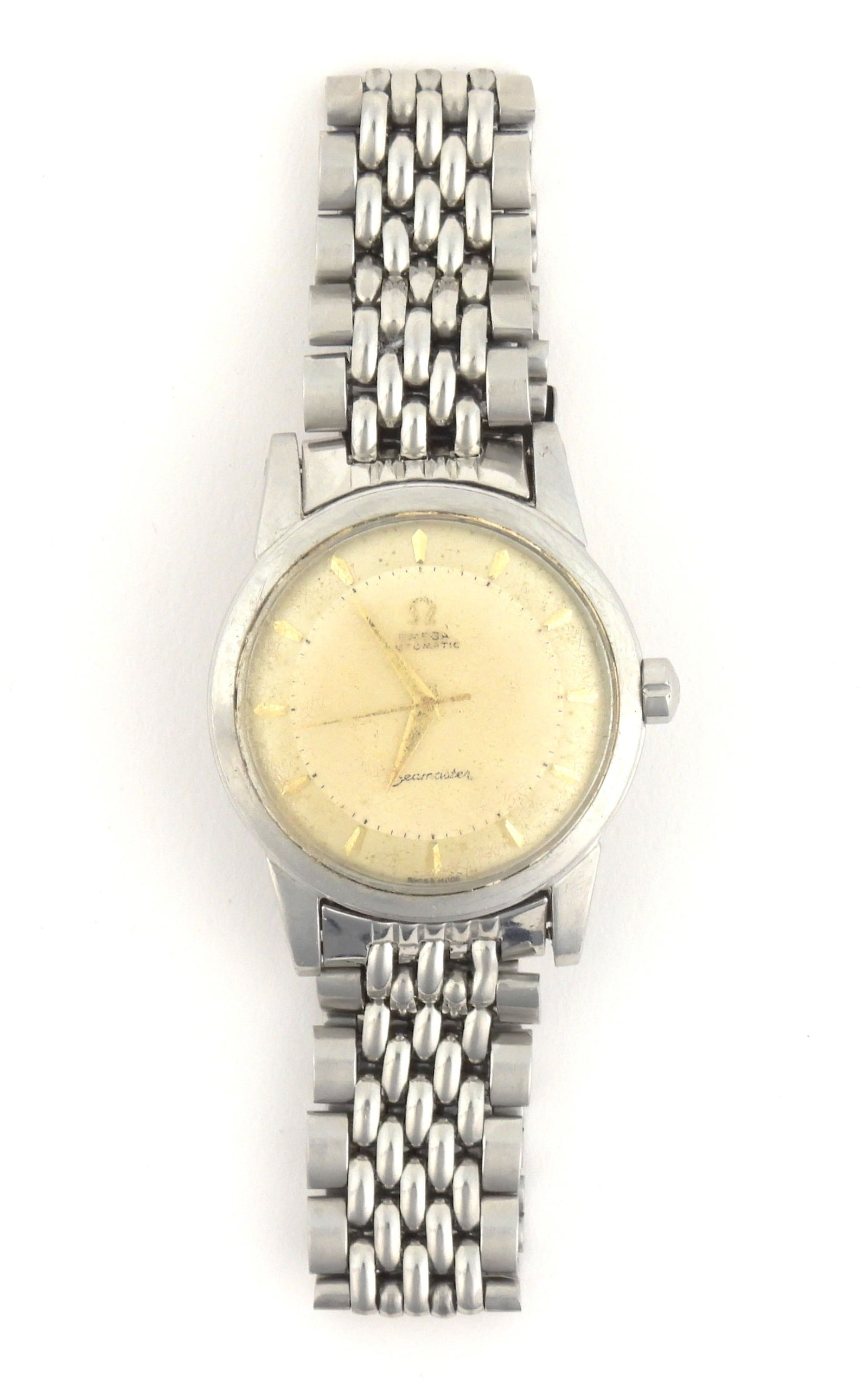 Vintage Men's Omega Automatic Seamaster Wristwatch: Switzerland, 20th Century, Stainless steel. Pale gold face with gold line chapter marks and hands housed in a stainless steel case. Band approx. 8" circumference