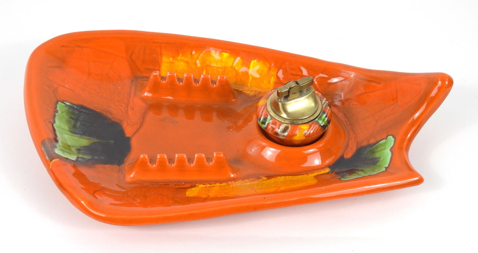 MCM Orange California Ceramic Ashtray: California, Mid 20th Century, Ceramic. Maurice of California style ceramic orange, yellow, and green ashtray with eight notched cigarette rests and matching globular table lighter. Tray 9 1/4" x 15