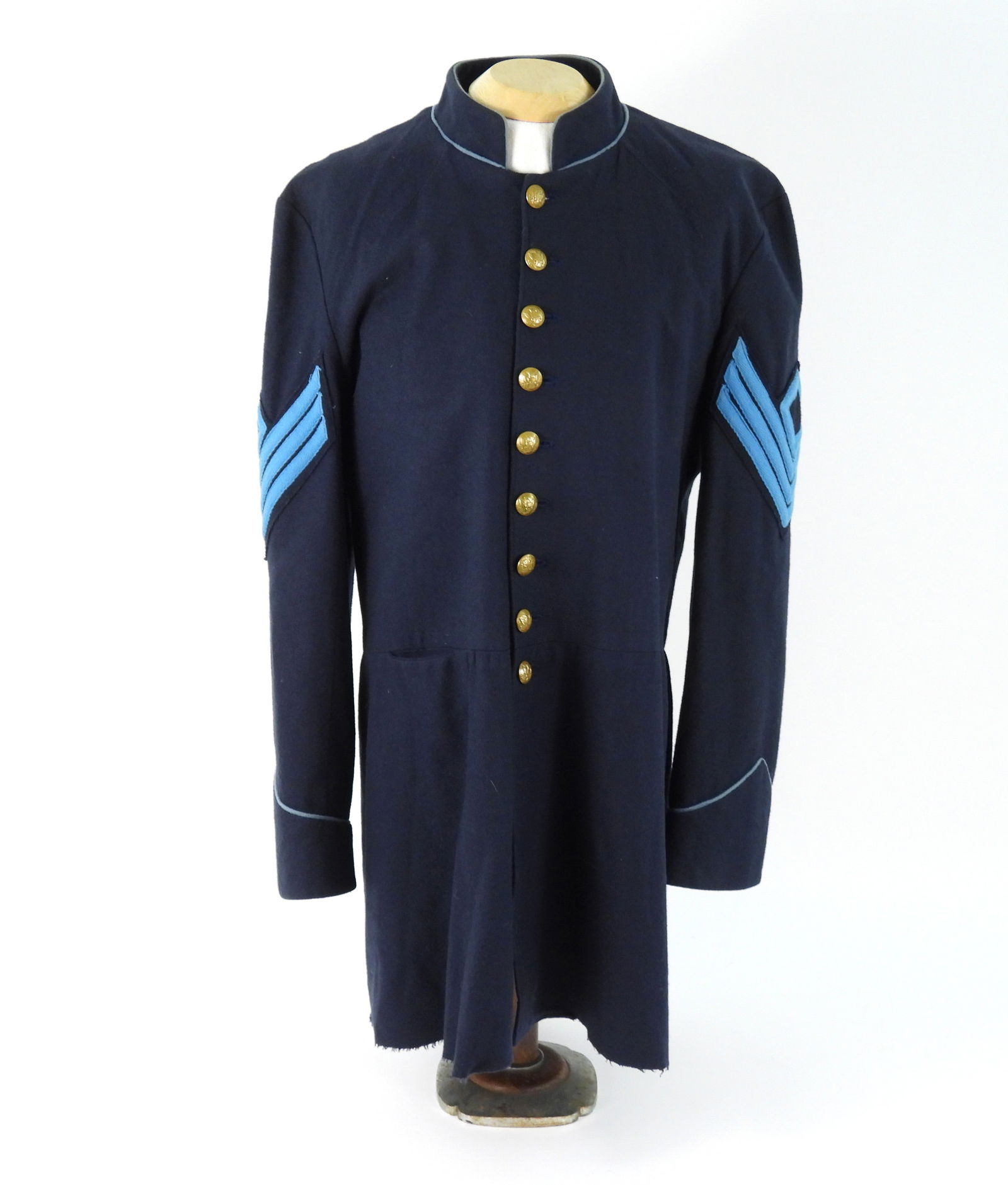 Civil War Re-Enactors 9 Button Union Frock Coat: Federal union infantry style enlisted man's frock coat with sergeant stripes. Nice condition with light use. No contemporary makers label.