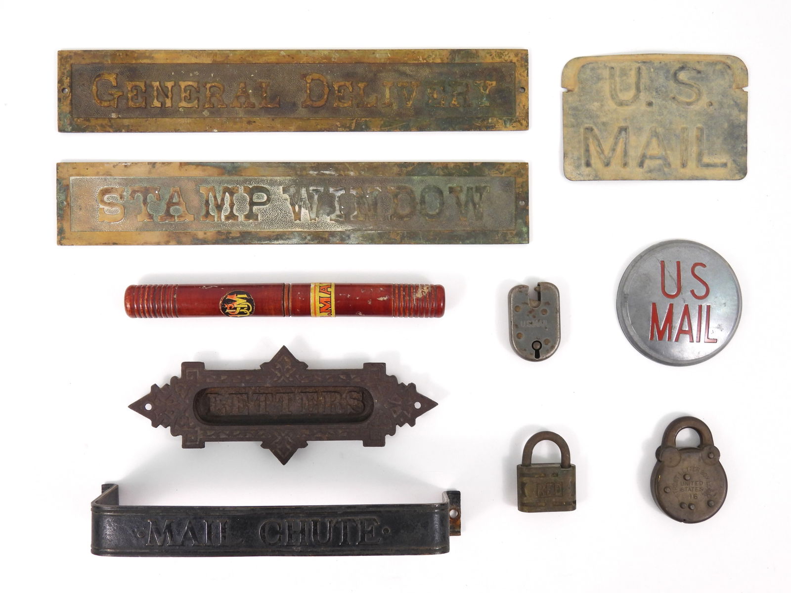Collection of Vintage U.S. Post Office Items: Includes two brass plaques, one marked "Stamp Window" and one "General Delivery" each measuring 12 3/4" x 2 1/8"; a "Mail Chute" bracket measuring 9 5/8" x 2 3/4"; three U.S. Mail letter box 
