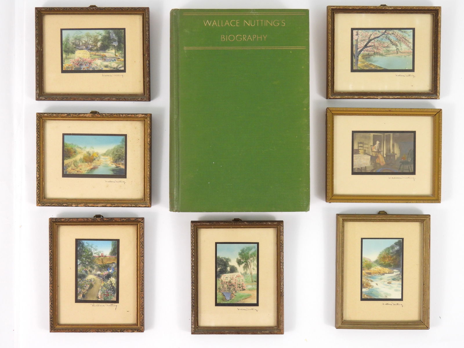 8PC Wallace Nutting Signed Book & Prints: Includes a 1936 Wallace Nutting Biography book signed by the author, and seven miniature framed and signed scenes exhibiting bold colors. Each measure 4 1/2" x 5 5/8.