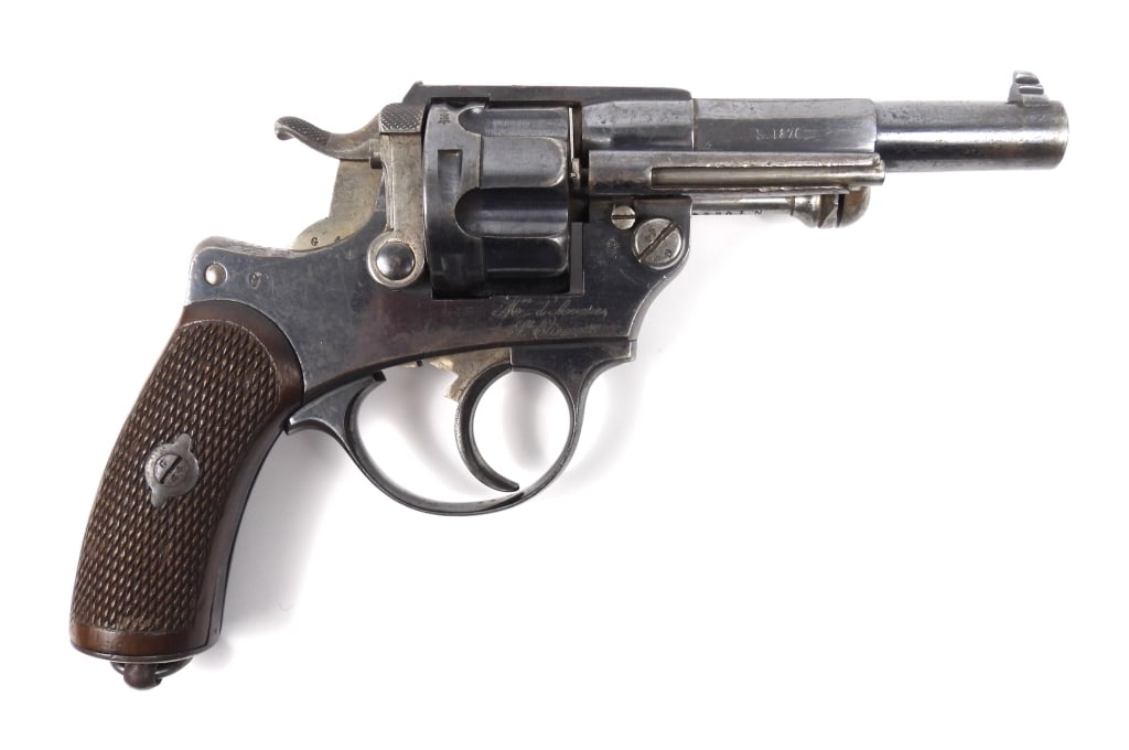 French Model 1874 Revolver: 11mm, serial number 10644, checkered walnut grips, blued finish, marked on the top of the barrel "Mle_1874", marked on the right side of the barrel "S. 1876", and marked on the right side of the