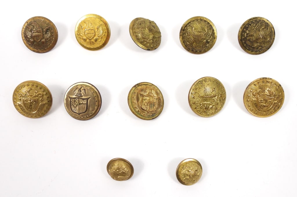 Group of Civil War-era Non-dug Buttons: A New Hampshire Volunteer Militia coat-size button with gilt finish and "SCOVILL MFG CO/WATERBURY" back mark (23.2mm);a cuff-size General Staff button with gilt finish and "SCOVILL MF'G CO./WATERBURY"