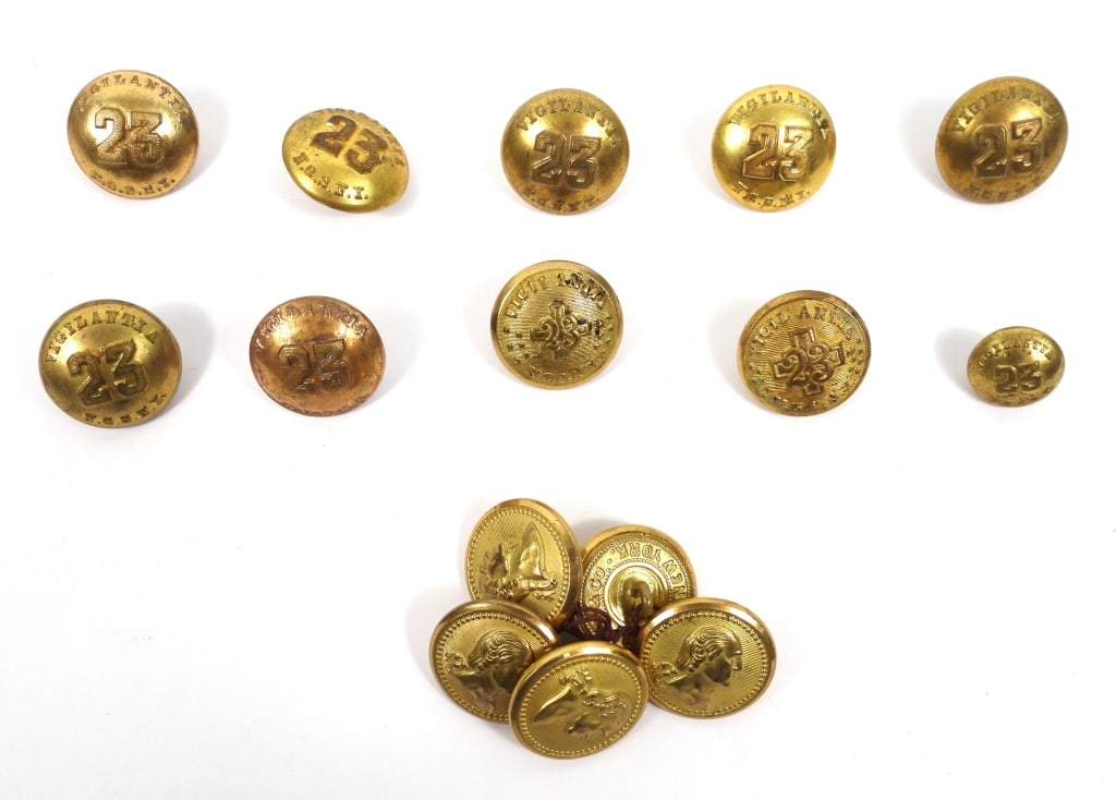 Group of Militia Buttons: Five coat-size Washington Grey buttons with gilt finish and a bust of George Washington, marked on the back "RIDABOCK & CO/NEW YORK" (23.2mm); a cuff-size 23rd New York button with gilt finish and no